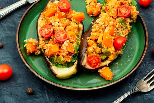 Grilled eggplant stuffed with pumpkin and quinoa. Vegetarian food recipe