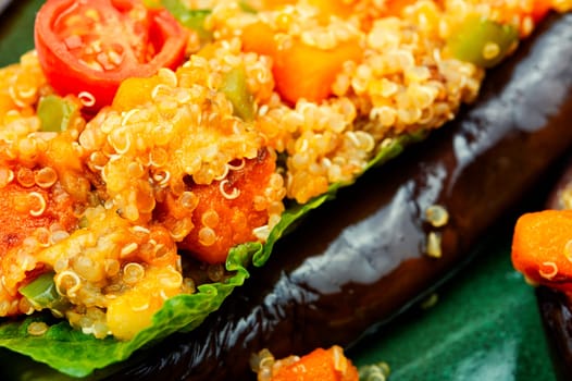 Grilled eggplant stuffed with pumpkin and quinoa. Vegetarian food recipe