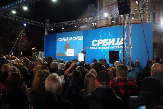 Sremska Mitrovica Serbia 03.17.2023 Rally of the Serbian Progressive Party SNS. President of the Republic of Serbia Aleksandar Vucic speaks to the electorate. Text - Serbia dreams and fulfills dreams