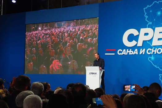 Sremska Mitrovica Serbia 03.17.2023 Rally of the Serbian Progressive Party SNS. President of the Republic of Serbia Aleksandar Vucic speaks to the electorate. Text - Serbia dreams and fulfills dreams