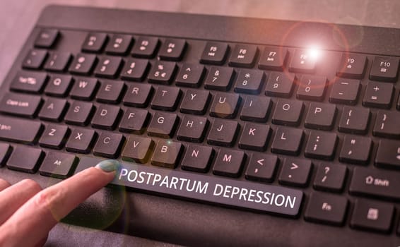 Handwriting text Postpartum Depression, Internet Concept a mood disorder involving intense depression after giving birth