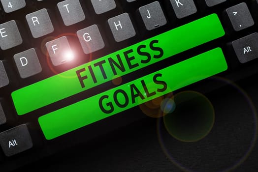 Text caption presenting Fitness Goals, Conceptual photo Loose fat Build muscle Getting stronger Conditioning