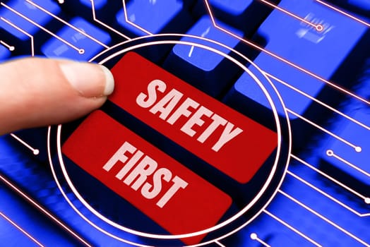 Text caption presenting Safety First, Conceptual photo Avoid any unnecessary risk Live Safely Be Careful Pay attention