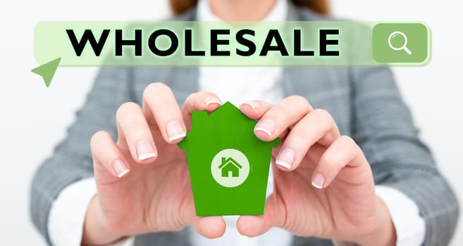 Hand writing sign Wholesale, Business overview the sale of commodities in bulk quantity usually for resale