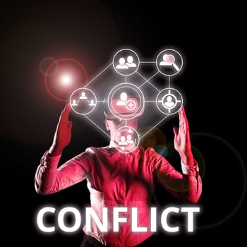 Hand writing sign Conflict, Concept meaning disagreeing with someone about goals or targets