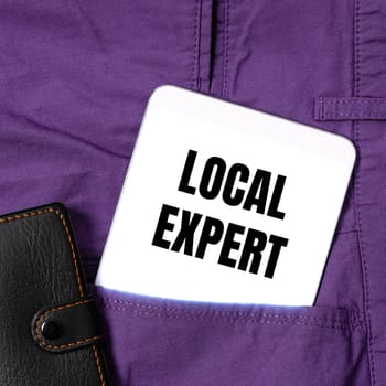 Hand writing sign Local Expert, Business concept offers expertise and assistance in booking events locally