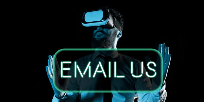 Writing displaying text Email Us, Business concept Sending a commercial message to a group of people using mail