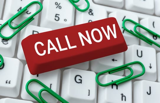 Sign displaying Call Now, Word Written on To immediately contact a person using telecom devices with accuracy