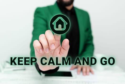 Hand writing sign Keep Calm And Go, Word Written on Be relaxed and continue working Motivation inspiration