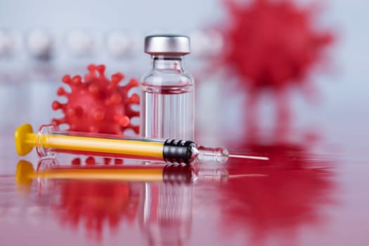 Close up medical syringe with a vaccine