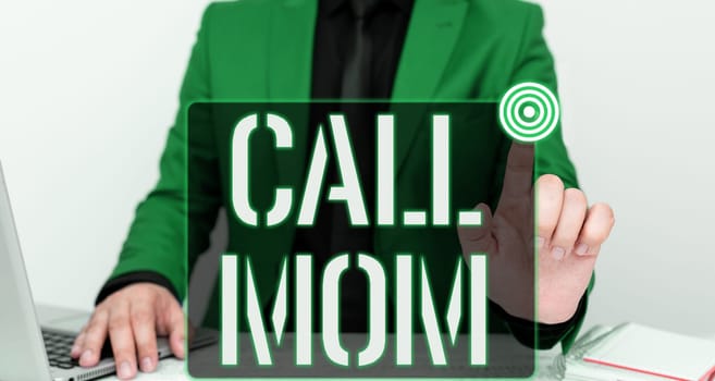 Sign displaying Call Mom, Business concept Attempting to communicate with the mother using the smartphone