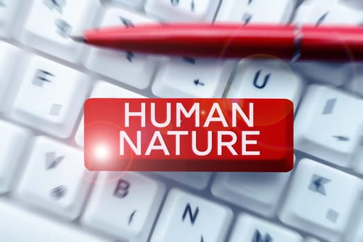 Conceptual caption Human Nature, Word Written on psychological characteristics, feelings, and behavioral traits of humankind