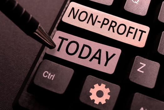 Conceptual caption Non Profit, Word Written on providing products or service without paying back in return