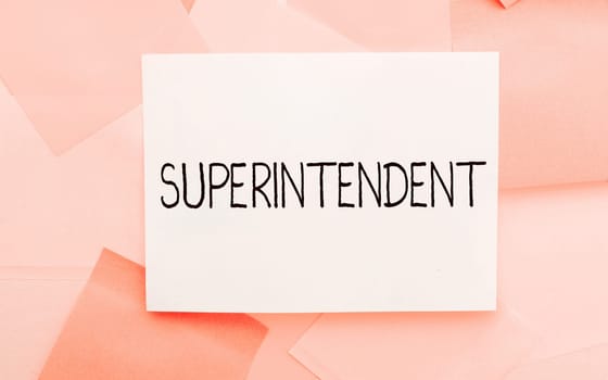 Hand writing sign Superintendent, Business overview a person who manages organization or activity of particular process