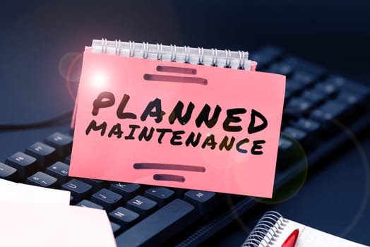 Sign displaying Planned Maintenance, Business overview Check ups to be done Scheduled on a Regular Basis