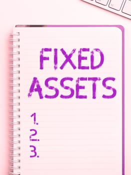 Writing displaying text Fixed Assets, Concept meaning long-term tangible piece of property or equipment a firm owns