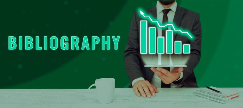 Writing displaying text Bibliography, Business overview a list of writings relating to a particular subject, period, or author