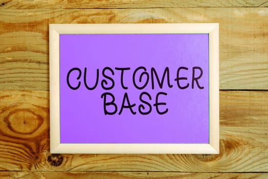 Writing displaying text Customer Base, Internet Concept encourage customers to buy your brand