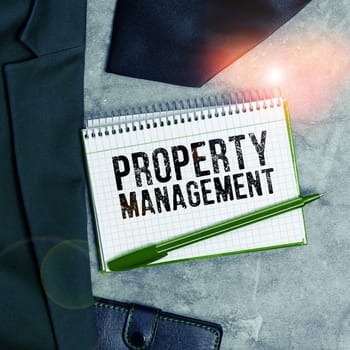 Sign displaying Property Management, Business approach Overseeing of Real Estate Preserved value of Facility