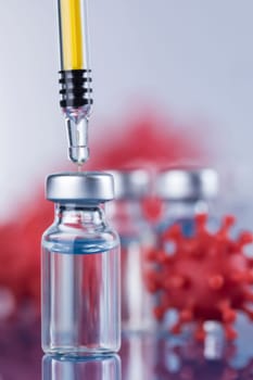 Close up medical syringe with a vaccine