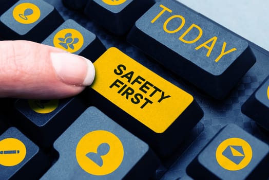Sign displaying Safety First, Word Written on Avoid any unnecessary risk Live Safely Be Careful Pay attention