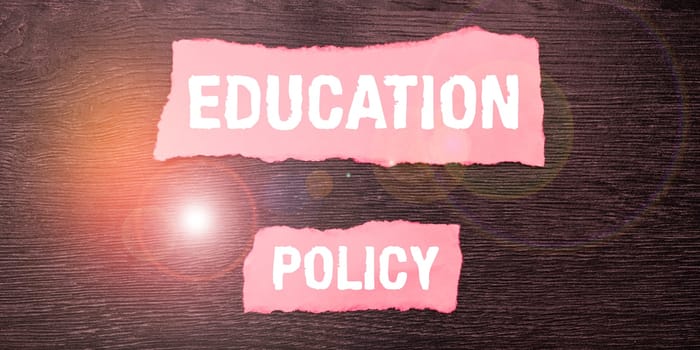 Sign displaying Education Policy, Business approach field of study that deals with methods of teaching and learning
