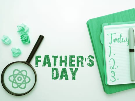 Text sign showing Father's Day, Word for day of year where fathers are particularly honoured by children