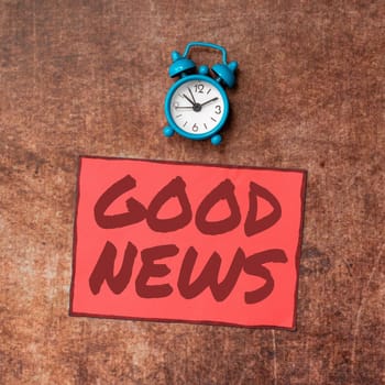 Writing displaying text Good News, Business overview Someone or something positive,encouraging,uplifting,or desirable