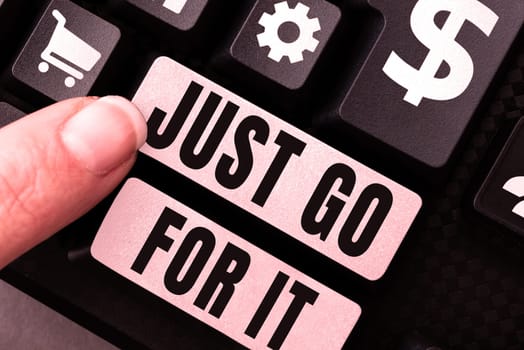 Hand writing sign Just Go For It, Concept meaning Motivation for starting doing something Have discipline