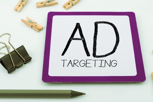 Text sign showing Ad Targeting, Word Written on target the most receptive audiences with certain traits