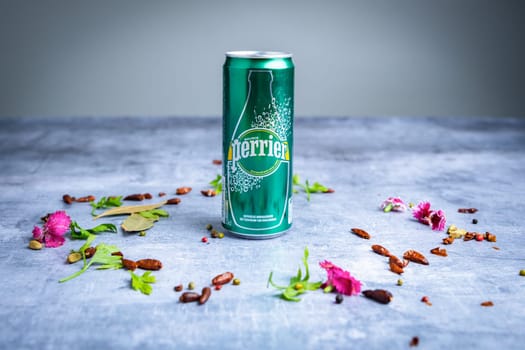 Bottle of Perrier water ready to be drunk