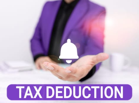 Handwriting text Tax Deduction, Business idea amount subtracted from income before calculating tax owe
