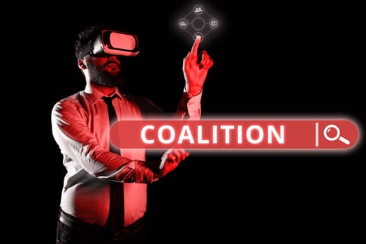 Hand writing sign Coalition, Word Written on a temporary alliance of distinct parties, persons, or states for joint action
