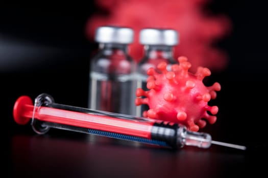 Close up medical syringe with a vaccine