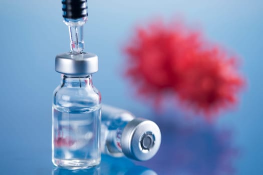 Close up medical syringe with a vaccine