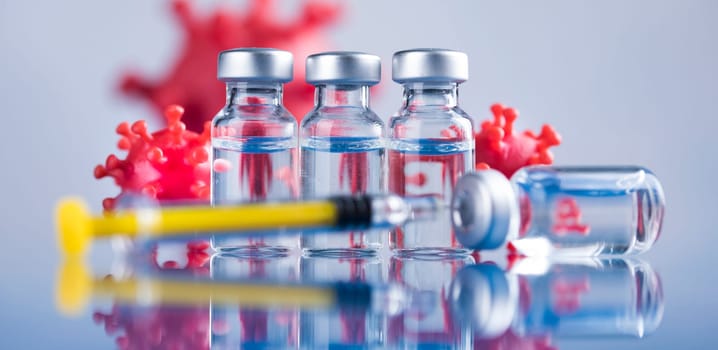 Close up medical syringe with a vaccine
