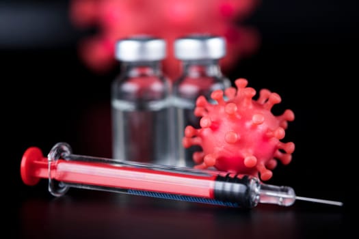 Close up medical syringe with a vaccine