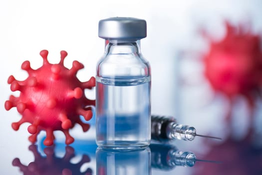 Close up medical syringe with a vaccine