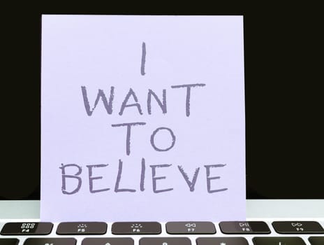Conceptual display I Want To Believe, Conceptual photo eager of being faithful positive motivation inspirational
