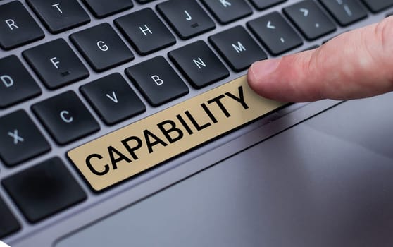 Hand writing sign Capability, Business approach the facility or potential for an indicated use or deployment