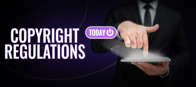 Hand writing sign Copyright Regulations, Business idea body of law that governs the original works of authorship