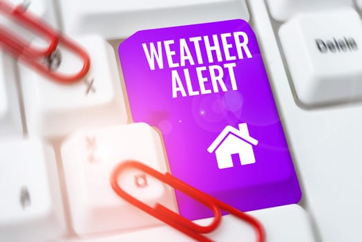Text caption presenting Weather Alert, Concept meaning urgent warning on the state of the atmosphere at a place and time