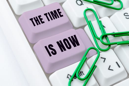 Hand writing sign The Time Is Now, Word Written on encouraging someone to start doing today Dont be late