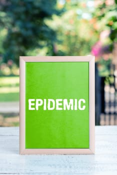 Writing displaying text Epidemic, Word for Widespread occurrence of an infectious disease in a community