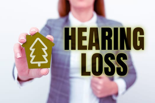 Writing displaying text Hearing Loss, Concept meaning is partial or total inability to listen to sounds normally