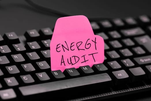 Sign displaying Energy Audit, Concept meaning assessment of the energy needs and efficiency of a building