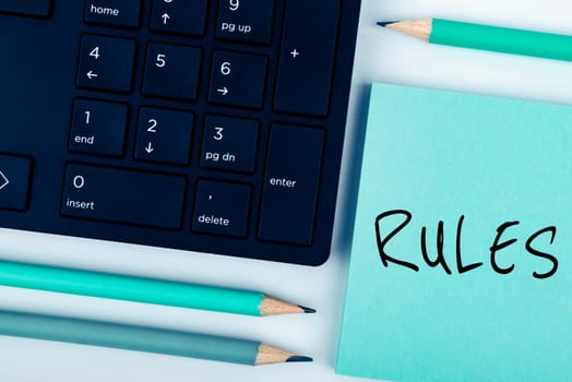 Sign displaying Rules, Business approach the laws or regulations prescribed for observance