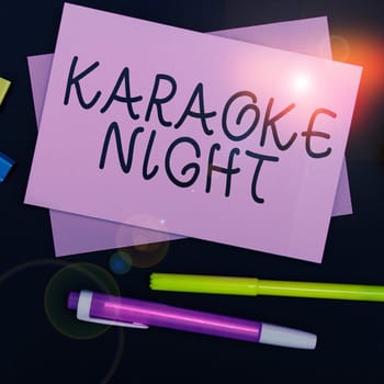 Conceptual caption Karaoke Night, Conceptual photo Entertainment singing along instrumental music played by a machine