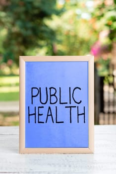 Writing displaying text Public Health, Business concept Promoting healthy lifestyles to the community and its people