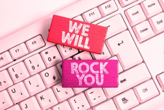 Text sign showing We Will Rock You, Concept meaning to be going out and facing the world and all that is in it